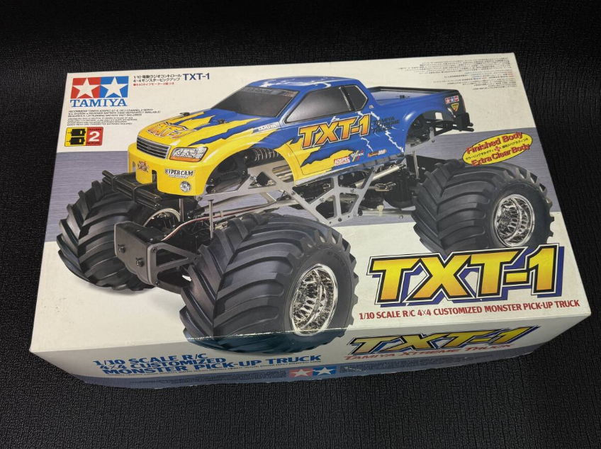 Tamiya 1/10 TXT-1 Monster Truck NIB + Lightweight Chassis + SANWA
