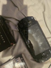 PSP Console Plus 3 Games. Good Condition. Charger Included.