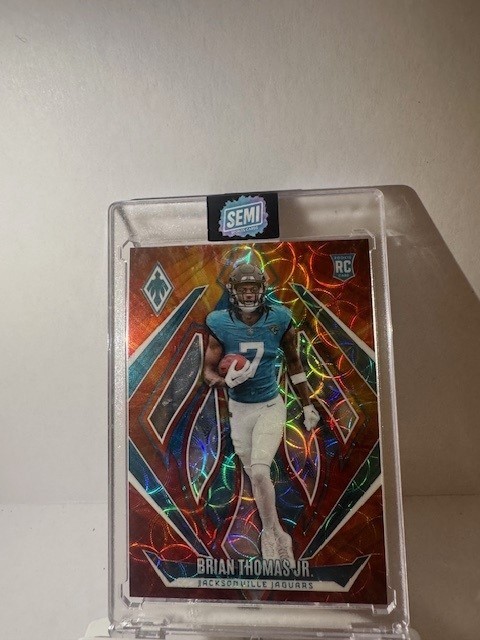2024 Panini Phoenix - Rookies Brian Thomas Jr. #164 Fire Burst /350 (RC)