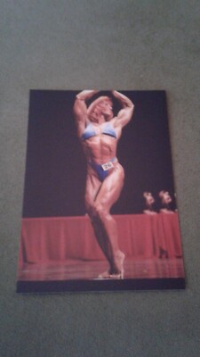 Photo of Female Bodybuilder flexing in Contest 3.5x5-Exc condition