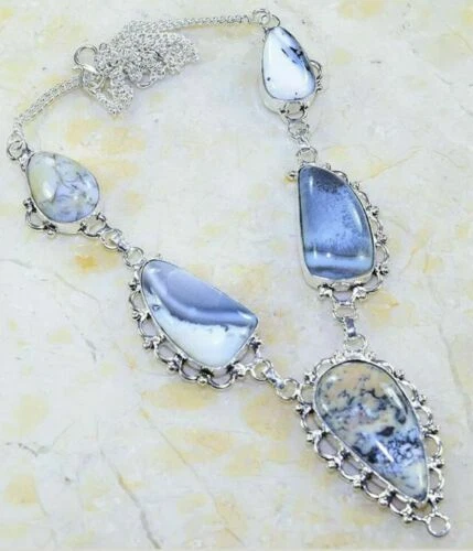 Gioielli antichi in argento con pietra principale opale