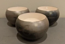 CB2 Ablaze Enamel Tealight Votive Candle Holders Bowls Goldish Bronze India