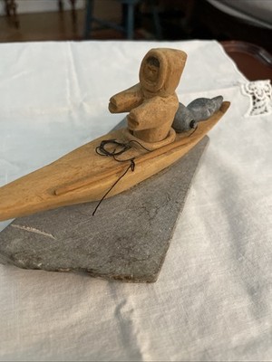 Hand Carved Inuit Hunter In Wooden canoe On soapstone Base 7 In