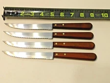 Vintage 4 Serrated Steak Knives With Wood Handles Un-Branded