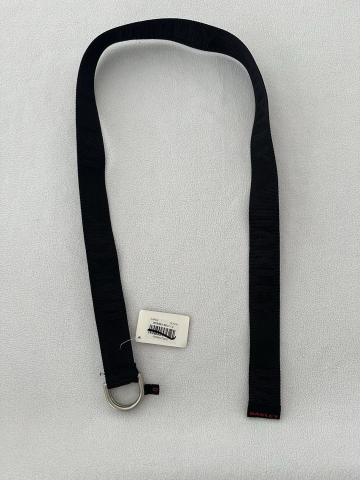 Cinturón Oakley Webbed 1.0 negro claro talla grande Oakley AOP hebilla de anillo plateado Foto 2 de 4