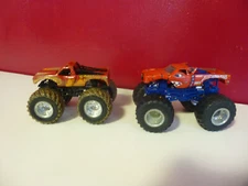 Hot Wheels MONSTER JAM Trucks Lot of 2: Brutus & Muddy El Toro Loco 1/64