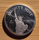 One Troy OZ, .999 Silver round coin. Liberty Mint, "Statue of Liberty" 1985