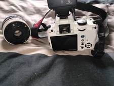Appareil photo Pentax K-r avec objectif d'origine 18-55 et objectif sigma 70 300