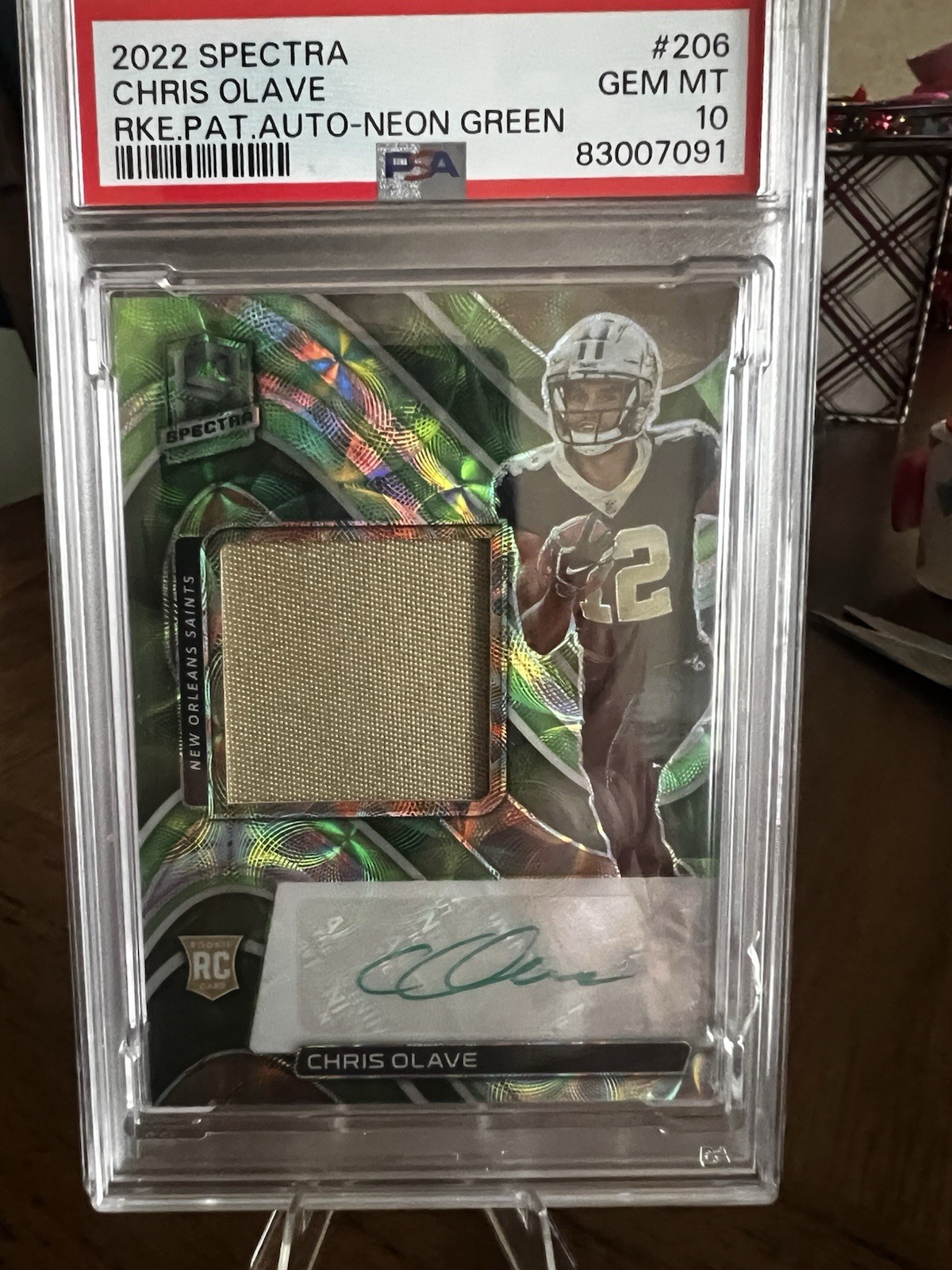 Chris Olave Panini Spectra #206 Rookie Patch Autograph-Neon Green