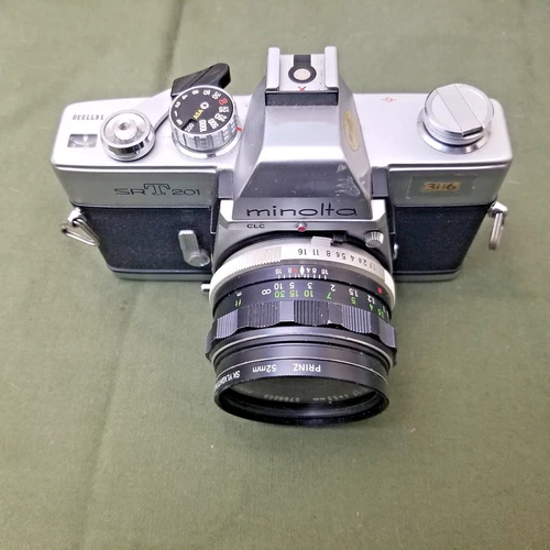 MINOLTA SRT201, CLC , SLR FILM CAMERA WITH A MC ROKKOR-PF  55MM 1:1.7 PRIME LENS