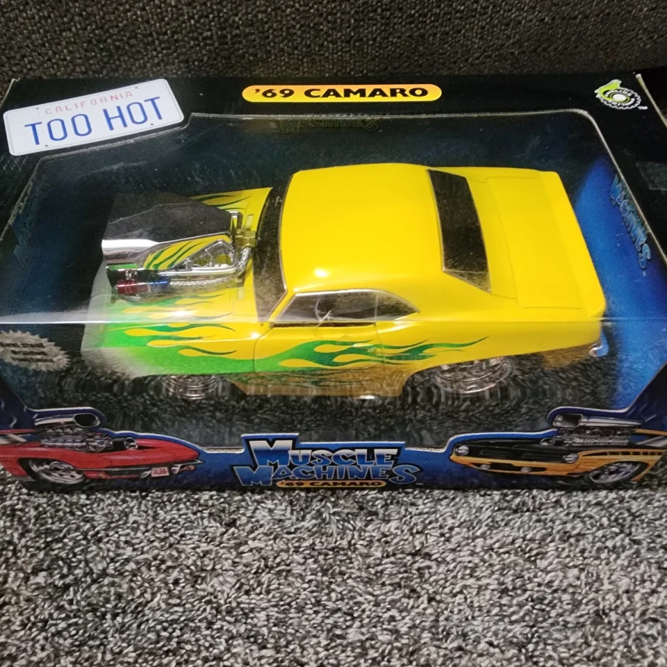 Muscle Machines 1/18 Scale '69 Chevrolet Camaro Yellow W/ Green Flames NIB - Image 4 of 4