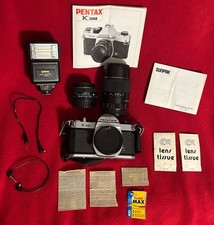 ASAHI - PENTAX - K1000 - SLR - 35 MM/2 LENSES/FLASH/MANUALS/CASE/CORD/FILM 2 