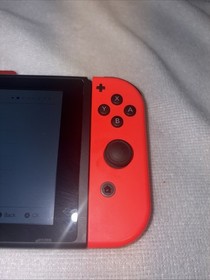 Nintendo Switch HAC-001 Neon Red/Blue JoyCons W/ Peach Case And 4 Games. EUC