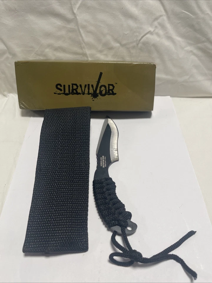 Cuchillo de hoja fija negro SURVIVOR mango Paracord y funda de nailon nuevo de Lote Antiguo Foto 2 de 4