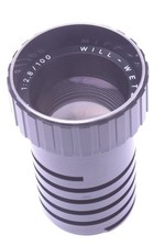   WILL WETZLAR MAGINON 100MM F/2.8 LENS PROJECTOR, PROJECTING PORTRAIT