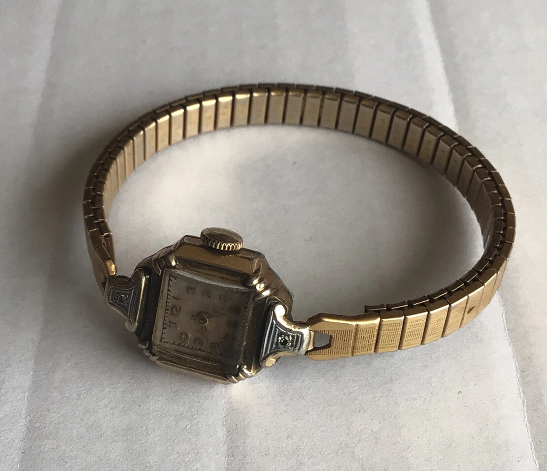 VINTAGE LADIES HALLMARK WATCH 10K GF WITH 2 DIAMONDS SWISS MADE 17