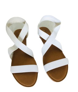 white elastic sandals