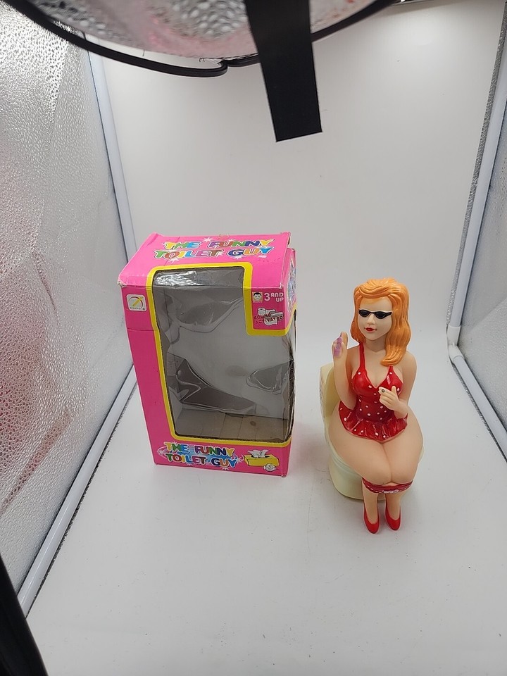 A tested, working vintage sound-activated toilet figure that reacts to noise — weird, specific, and delightfully functional retro kitsch.