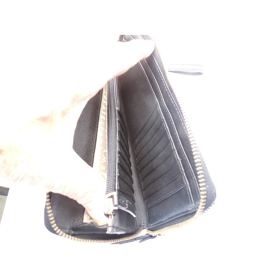 Bolso sin asas Kate Spade Muñequera Beige Negro Lunares Cremallera Usado Interior limpio Foto 3 de 4