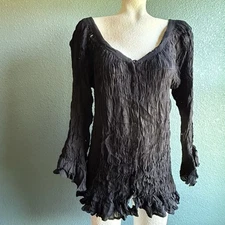 Raiment Y2K long sleeves with ruffled cuffs, a v-neck, and a button-down front