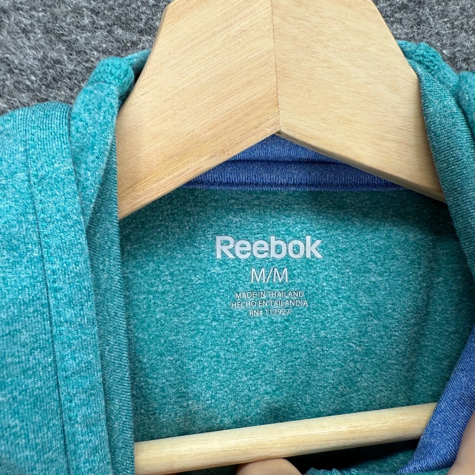 Chaqueta deportiva Reebok Activewear para mujer M azul medio con capucha 1/4 cremallera manga larga Foto 3 de 4