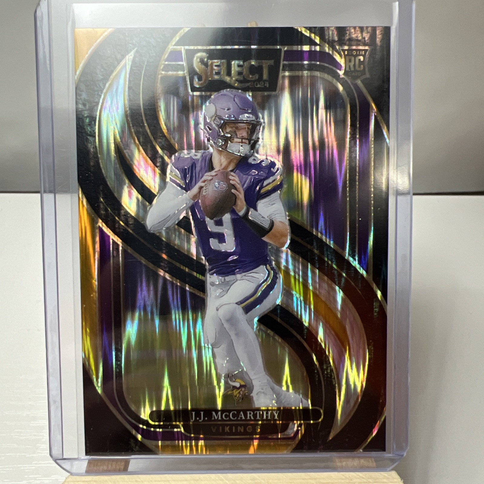 2024 Panini Select -J.J. McCarthy RC #134 Black & Gold Prizm Shock Vikings N