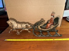 UNBRANDED CAST IRON HORSE DRAWN SLEIGH WITH LADY PASSENGER   14 INCHES LONG 
