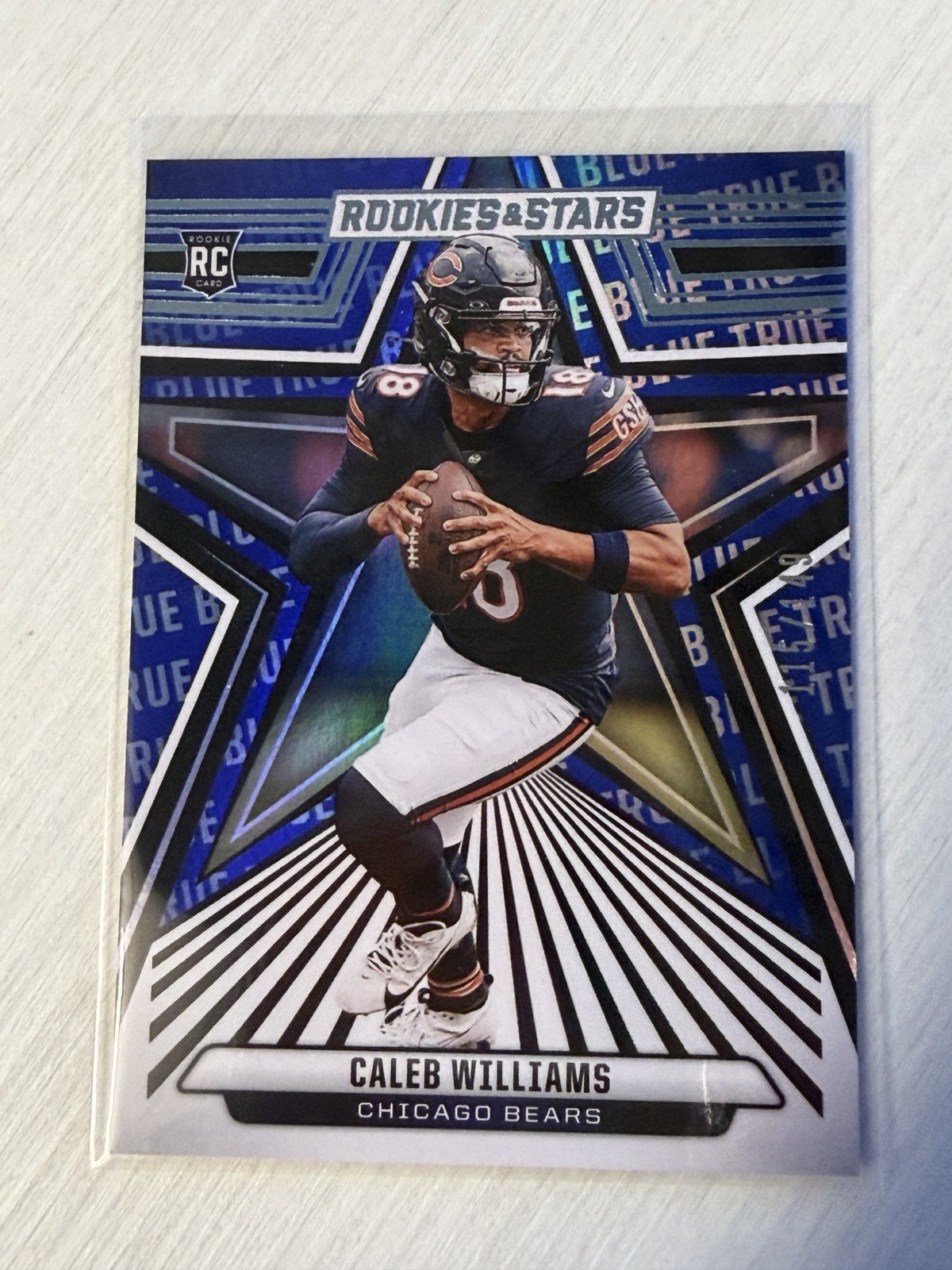 2024 Panini Rookies & Stars - Rookies Caleb Williams #118 True Blue /149 (RC)