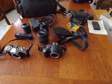 lot apareil photo minolta  / nikon + zoom  /handycam video sony + accessoires