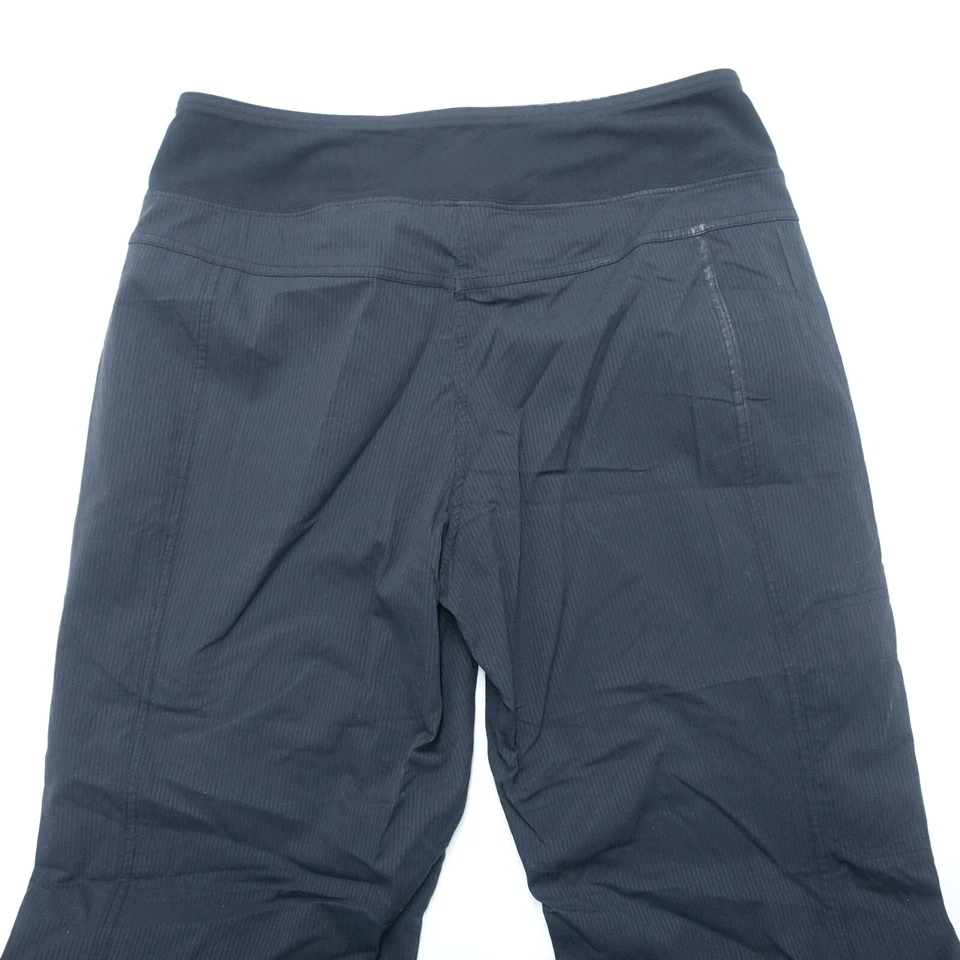 Pantalones para mujer Reebok 8 azules a rayas elásticos bolsillos con cremallera pierna ancha Foto 2 de 4