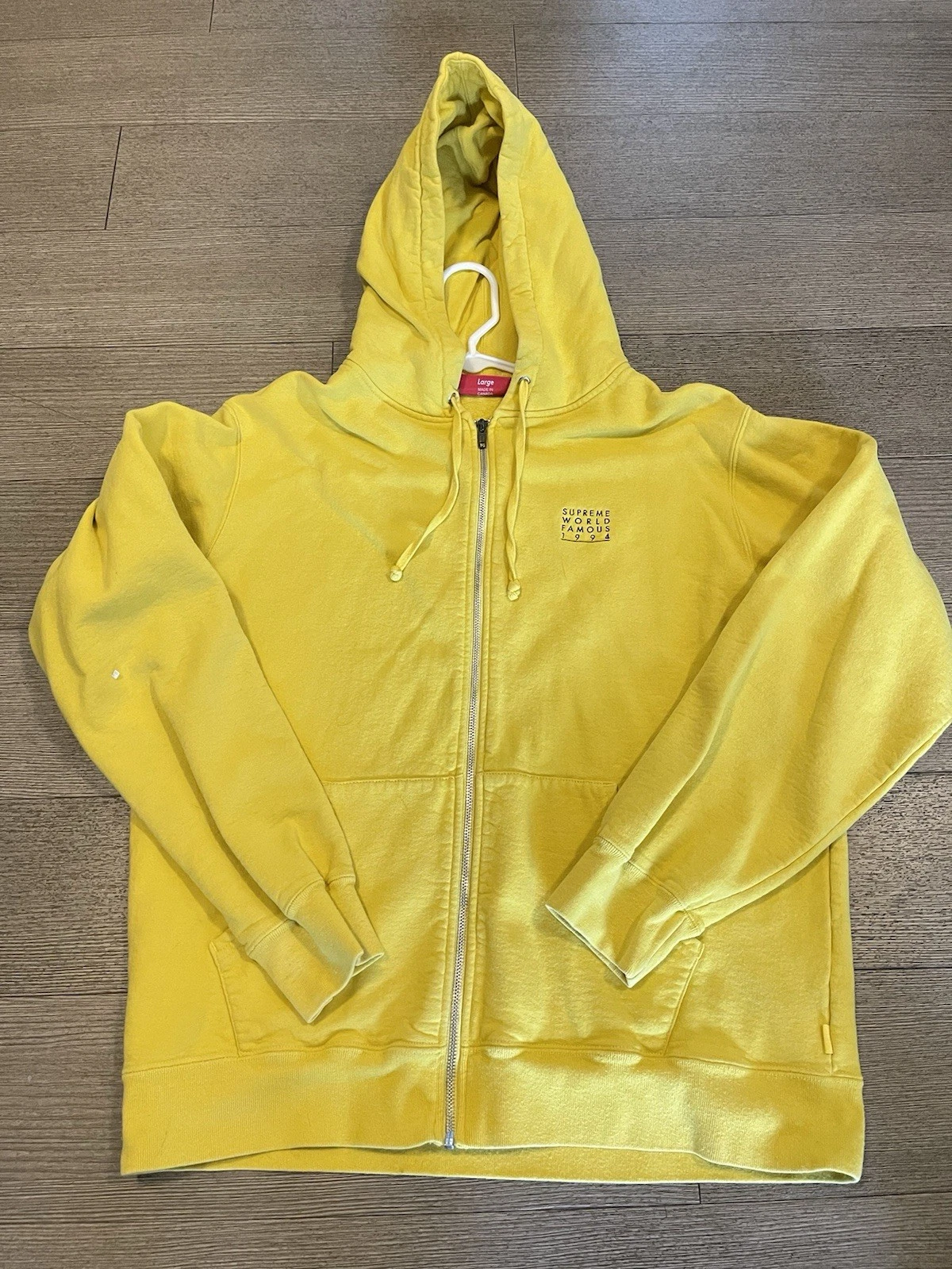 Sweat à capuche zippé jaune Supreme World Famous 1994 taille L porté 2 fois seulement