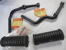 NOS NEW OEM ORIGINAL SUZUKI T250 T350 GT250 DRIVER PEG AND BRACKET SET 1968-77