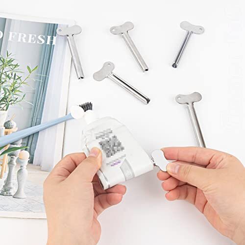 10 Stück Edelstahl Zahnpasta Tube Quetscher Schlüssel Roller Tube für Sahnetube - Bild 8 von 9