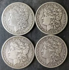 1879 O, 1884, 1887 O, and 1901 O $1 Morgan Silver Dollars