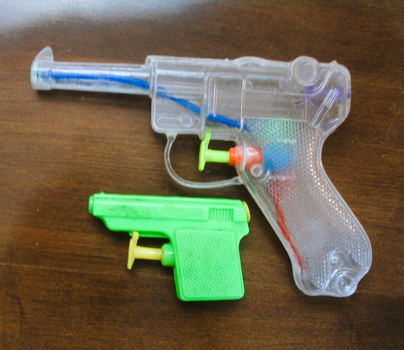 2 Vintage TK 1980's water squirt guns