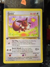 first edition eevee pokemon card 1st - 55/82 Non-Holo search your deck for that evolves from Eevee that is the same type as the Energy card you attached to Eevee Eevee Team Rocket 1st Edition