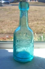 SQUAT EMBOSSED, F DUSCH RICHOND, VA  THIS BOTTLE IS NEVER SOLD, REAR XXX PORTER