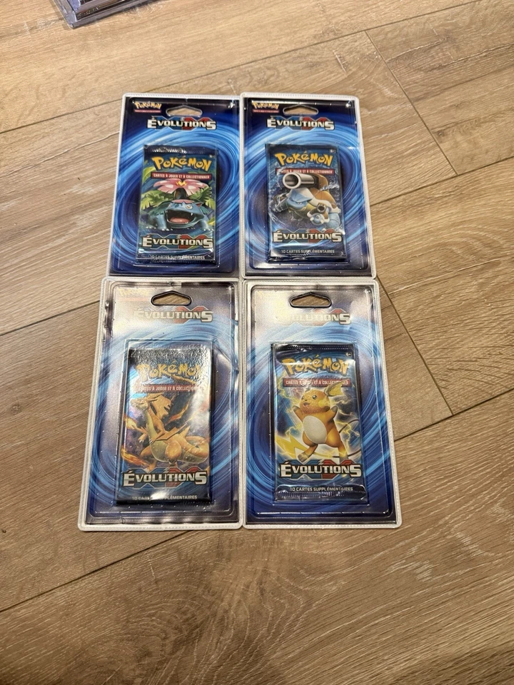 The Pokémon Company Pokémon JCC XY - Évolutions Lot 4 boosters FR - Photo 1/2