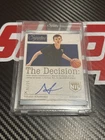 2025 Panini Nikolas Khamenia Base Optic Autographs - Holo (/99) (Raw)