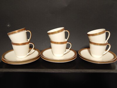 Set 6 Tazzine Da Caffe' Con Piattino Con Decorazione Righe 270046 Di Porcellana