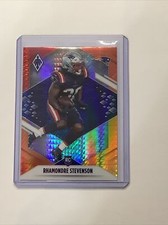2021 Panini Phoenix Rhamondre Stevenson Rookie Fire Burst Card RC #133 A-30. rookie card picture