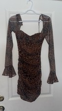New With Tags Small Windsor Animal Print Body Con Dress. Ruffle Sleeve Zip Up