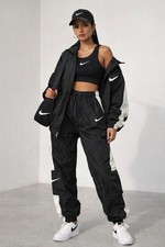 Nike Windbreaker Track Pants Women  s Small Mesh Lined Athletic Joggers 90s Style