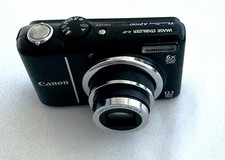Canon PowerShot A2100 IS 12.1MP Digitalkamera...