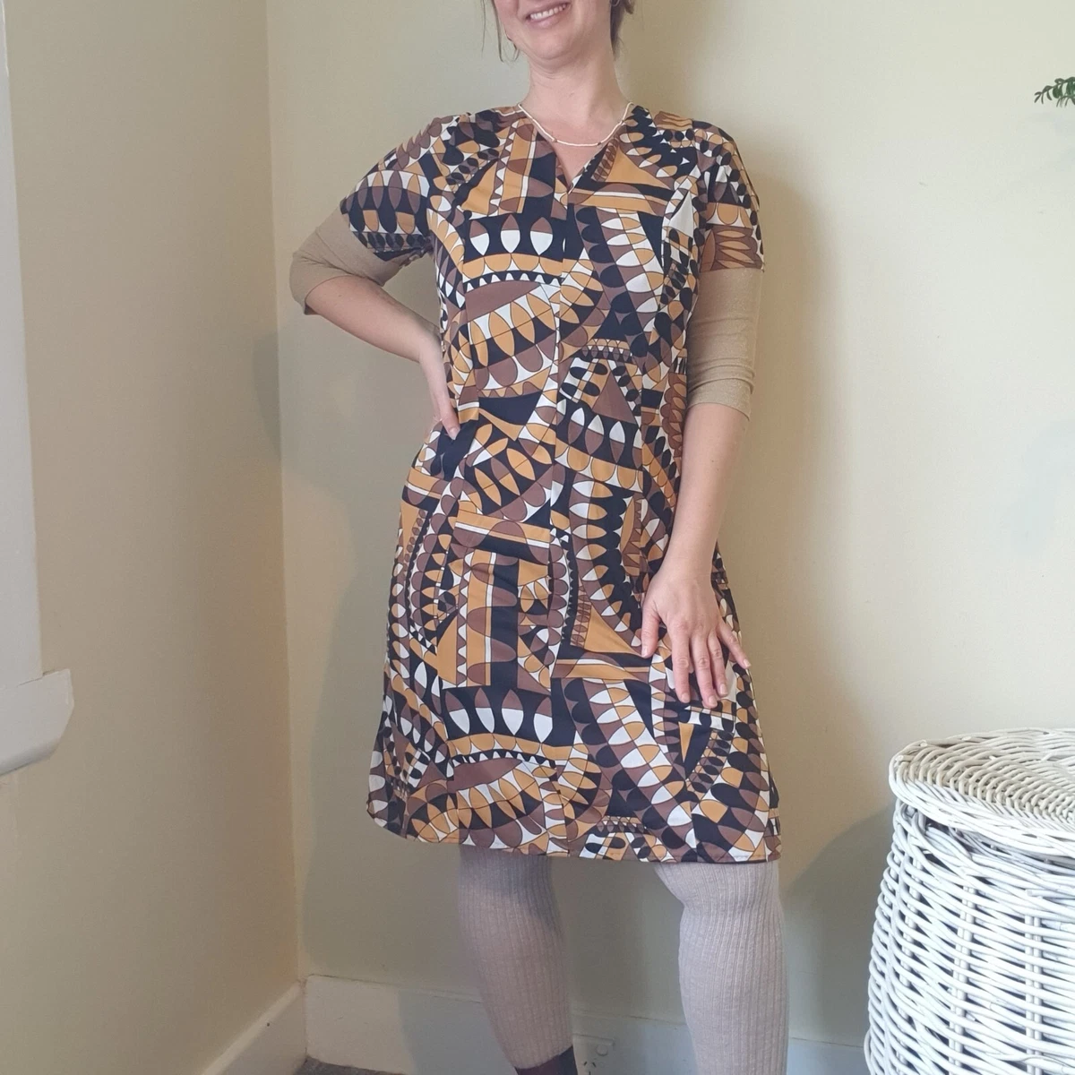 Combined a 60's vintage mod dress pattern with African fabric, and