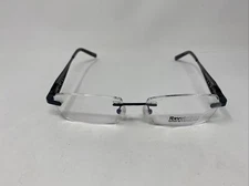 REVOLUTION EYEWEAR REV705 52/17/140 BLACK GUNMETAL RIMLESS FLEX HINGE “P09