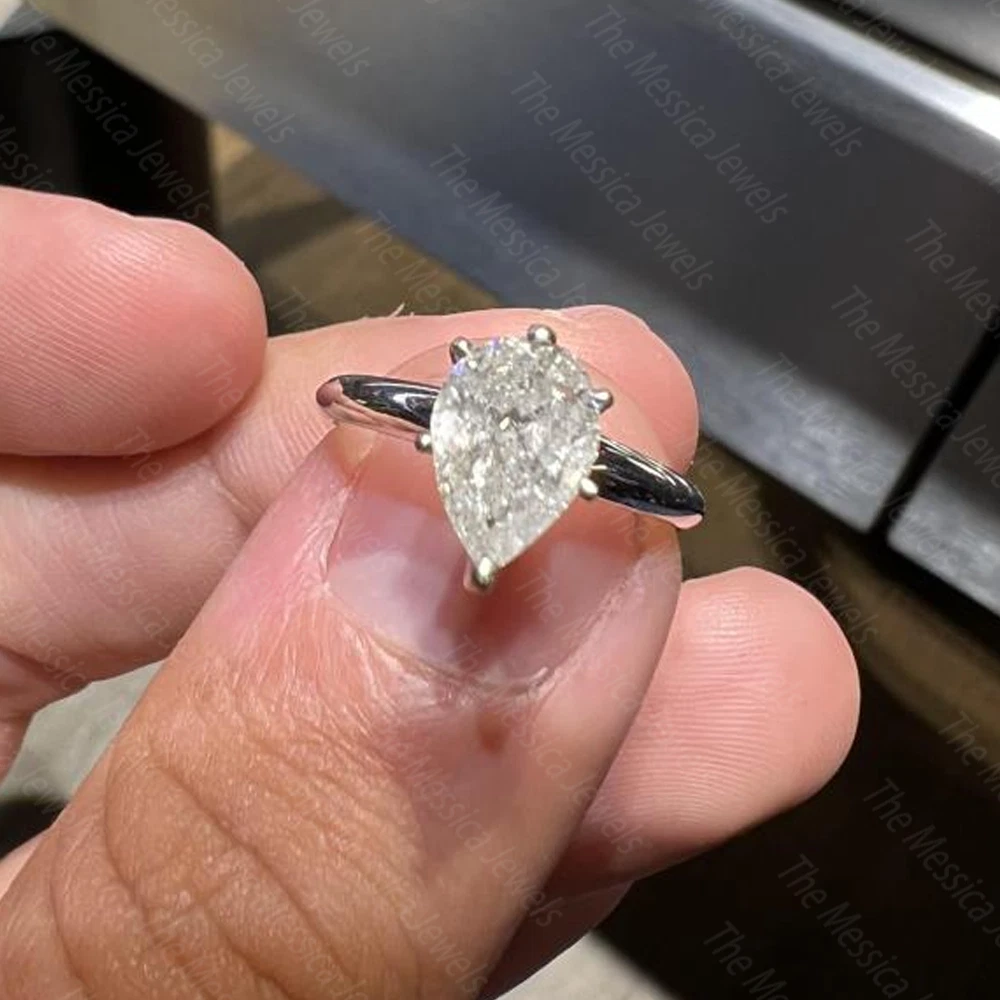 Pear cut solitaire diamond ring Clearance