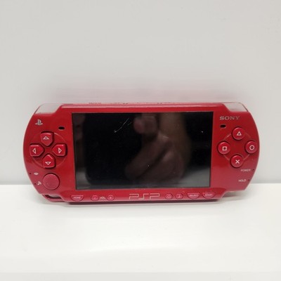 Sony PSP 2001 Red Slim Lite Handheld Console with Capcom Classics Reloaded UMD