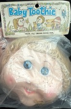 Cabeza de muñeca Baby Toothie cabello coleta marrón paquete original 1984 Mangelsen’s de colección