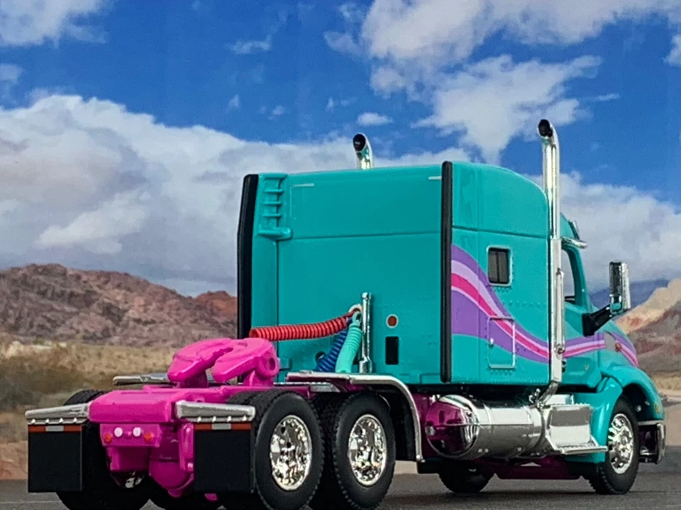 1/64 DCP TEAL/PINK/PURPLE PETERBILT 579 W/ 72" MID ROOF SLEEPER - Image 2 of 4